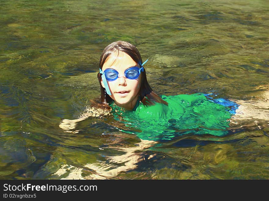 Girl Enjoying The River Water