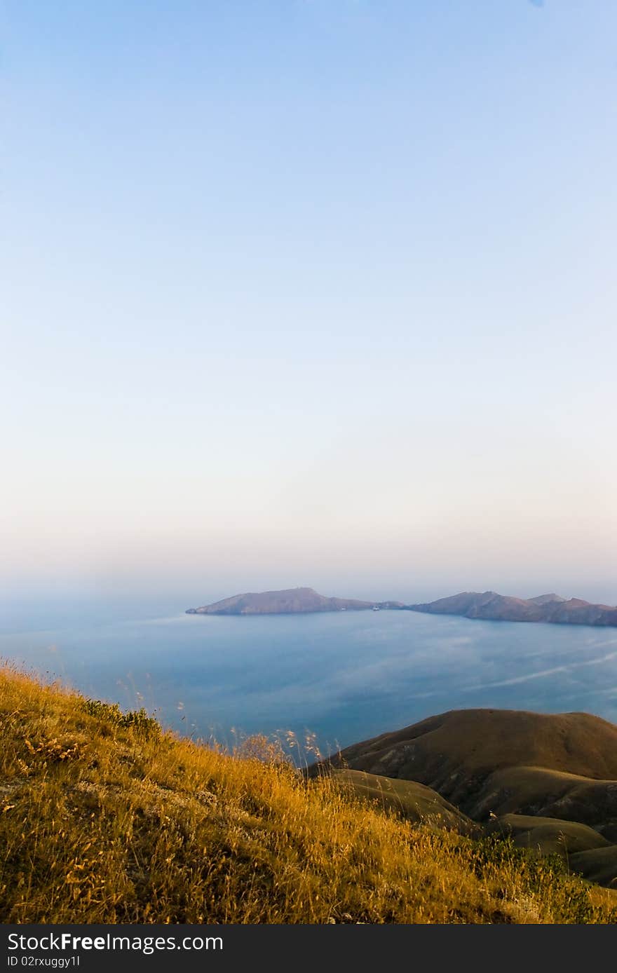 Beautiful bay in Crimea. Black sea. Vertical photo. Beautiful bay in Crimea. Black sea. Vertical photo