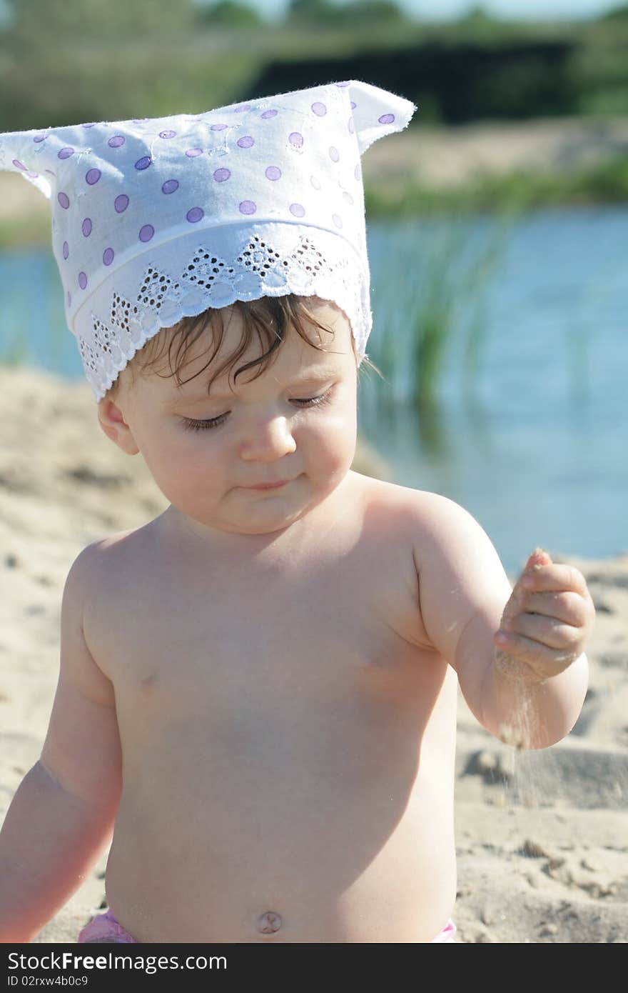 The Little Girl On A Beach