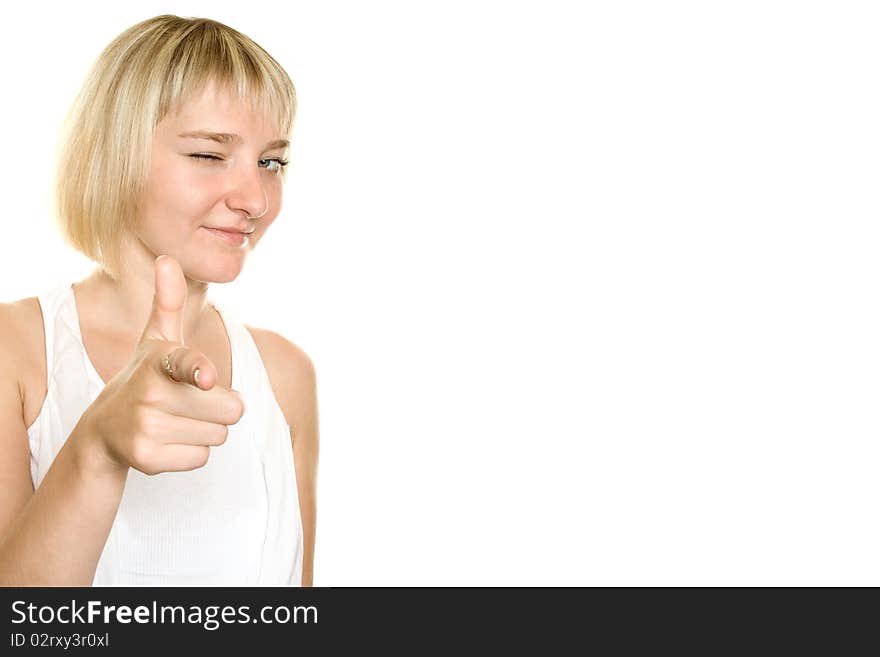 Young girl pointed a finger in the frame. Isolated on white background