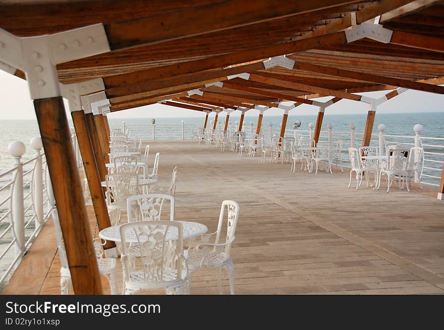 A Day walk, alone on the empty touristic Wooden deck on Caspian Sea. A Day walk, alone on the empty touristic Wooden deck on Caspian Sea