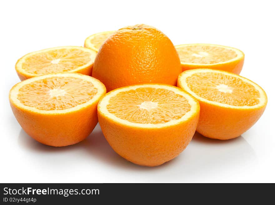 Orange halves on white background