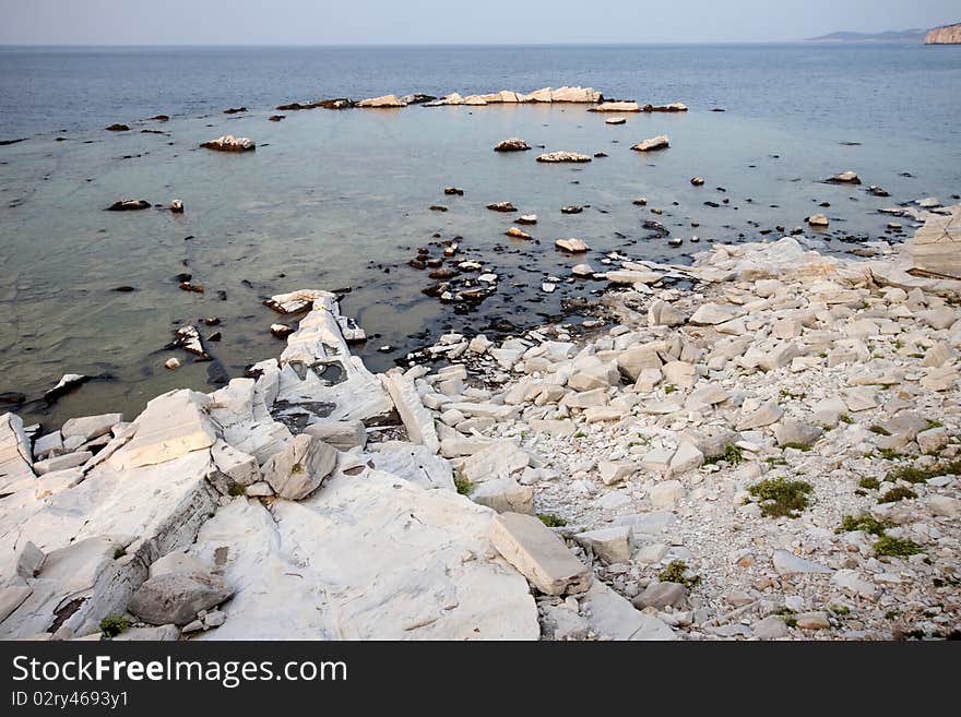 Blocks of marble in the sea on Aliki, Thassos island, Greece