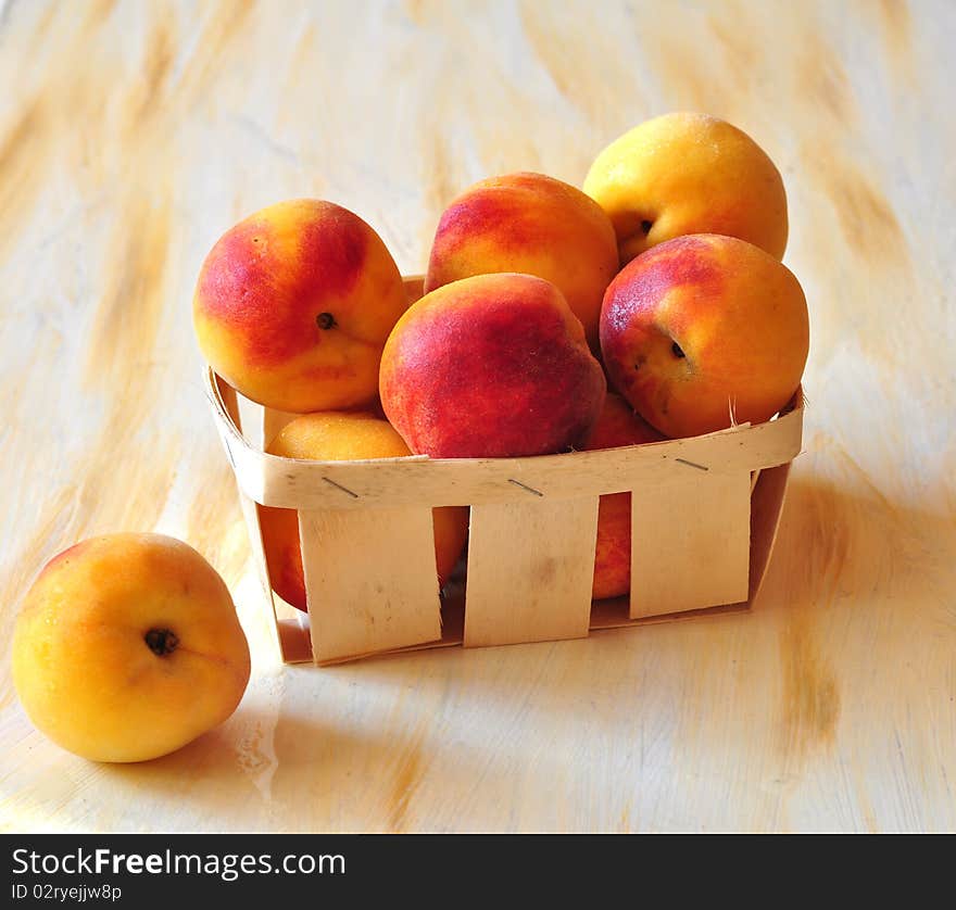 Peaches Are In A Small Basket