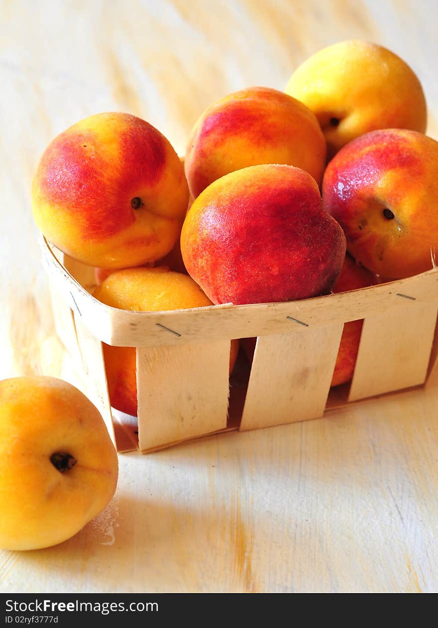 Peaches Are In A Small Basket