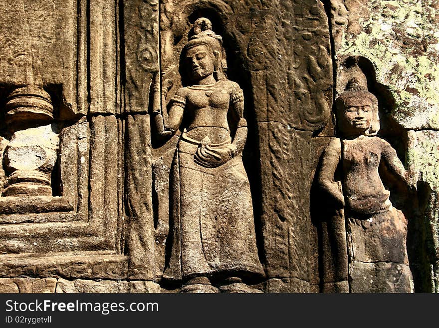 Carved in the walls at Angkor Wat Siem Reap Cambodia. Carved in the walls at Angkor Wat Siem Reap Cambodia.