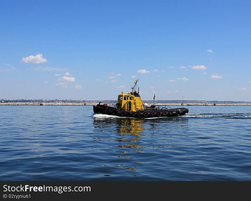 Moving tugboat