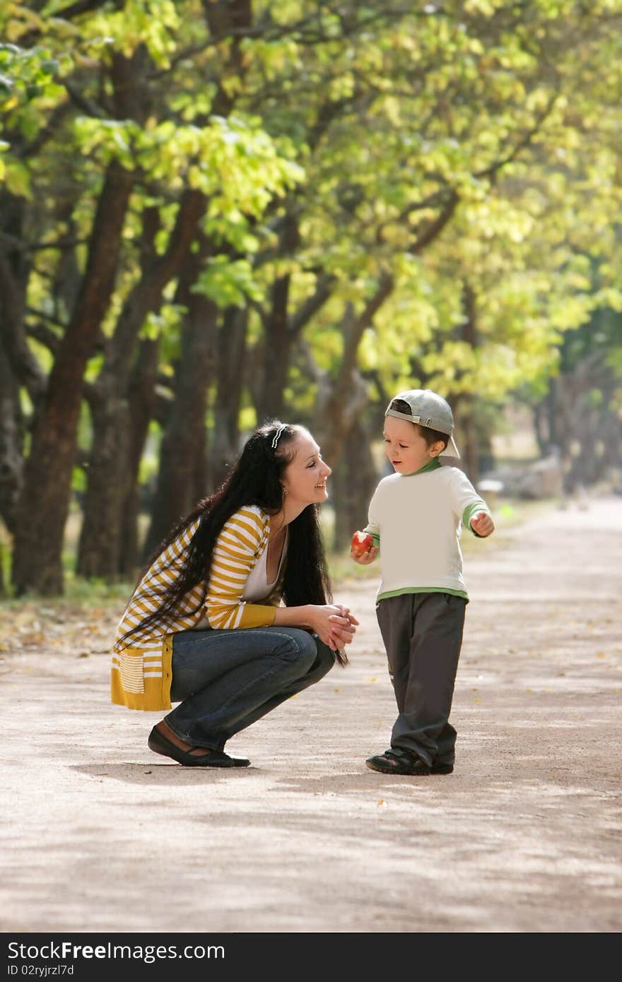 Mother and son in park