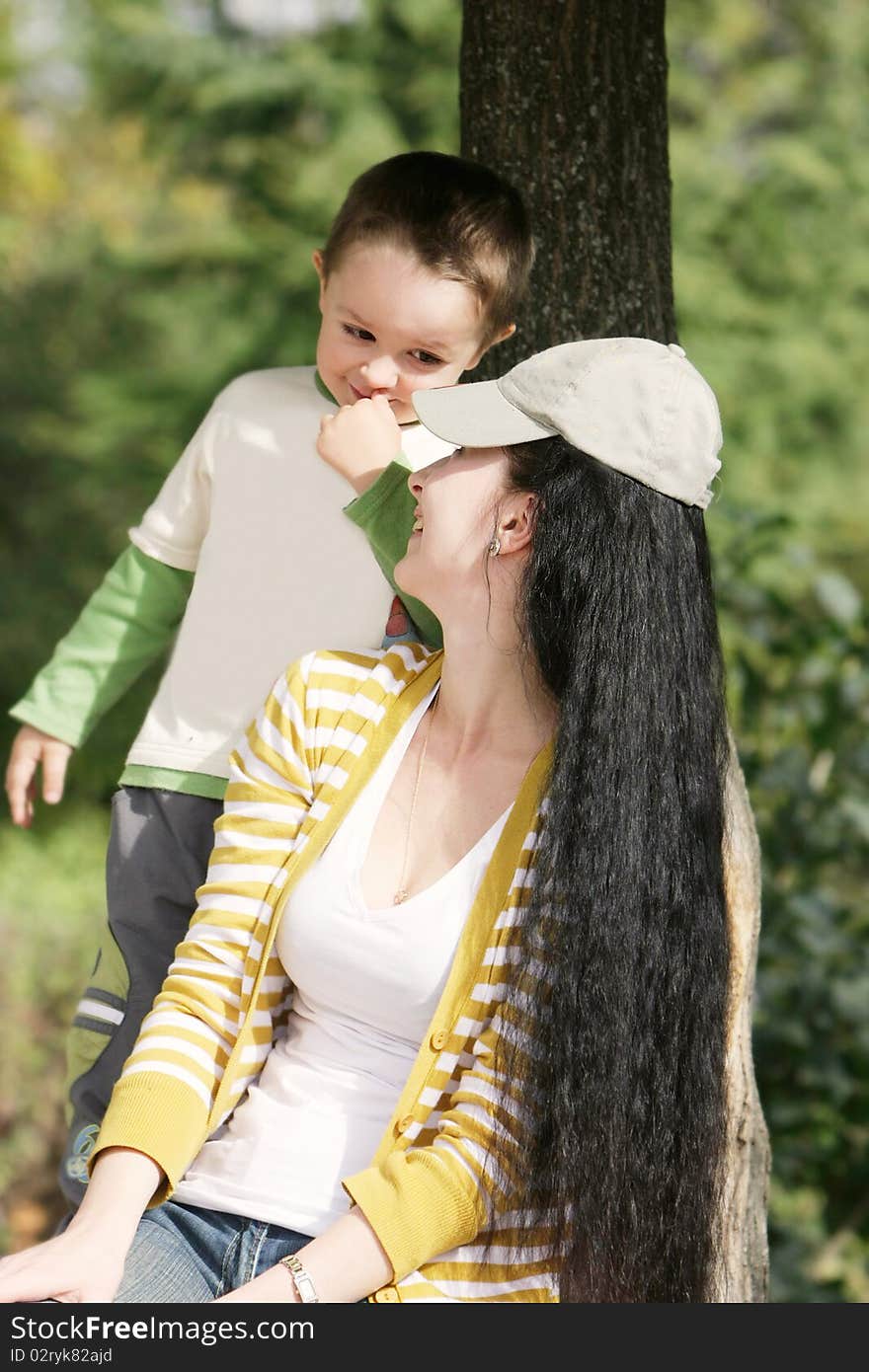 Portrait of mother and son outdoors