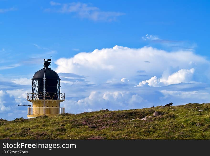 Rubha Reidh Lighthouse With Storm Clouds