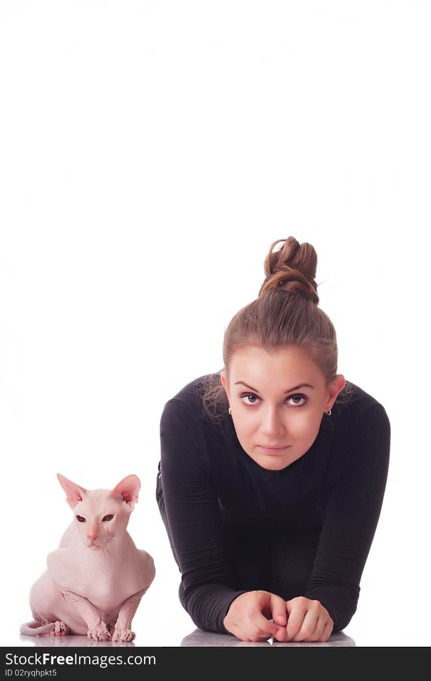 Beautiful young woman with a cat on a white background