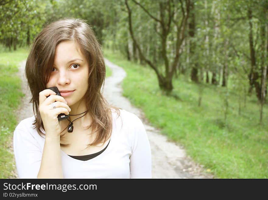 Young woman is thinking and smiling