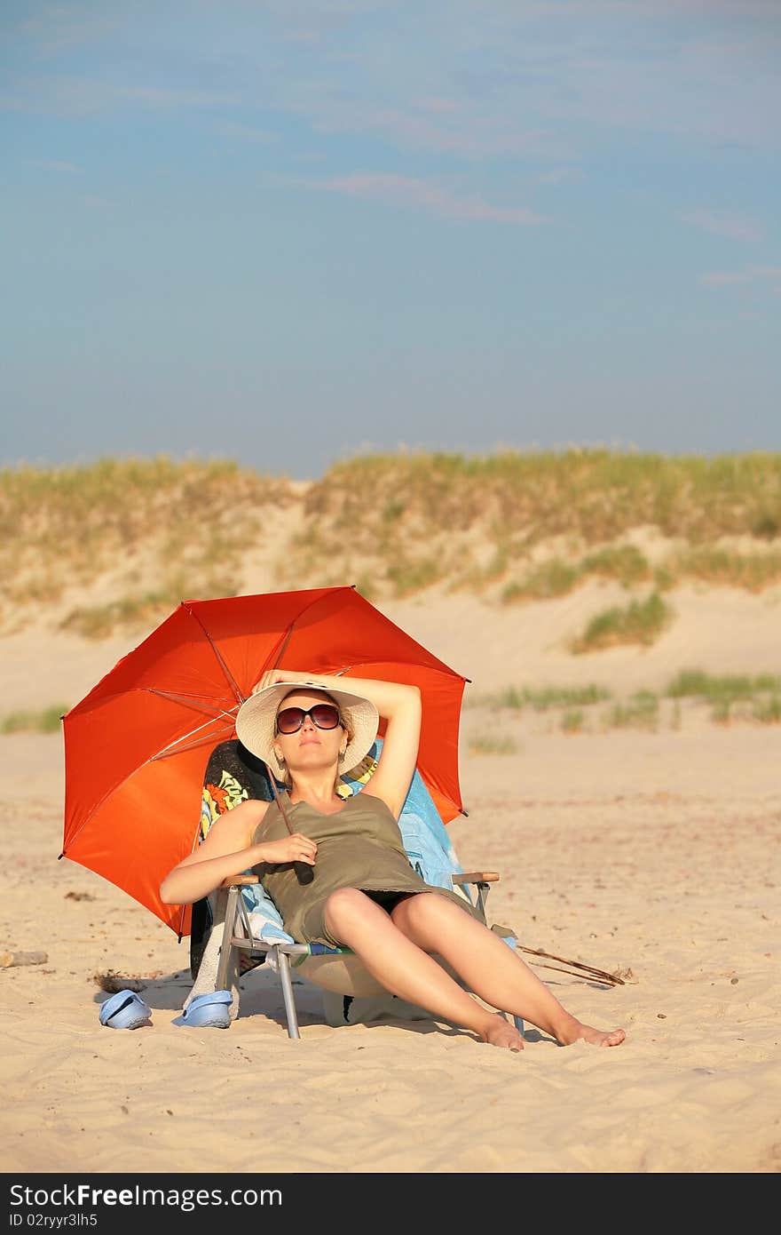 Pregnant woman on the beach