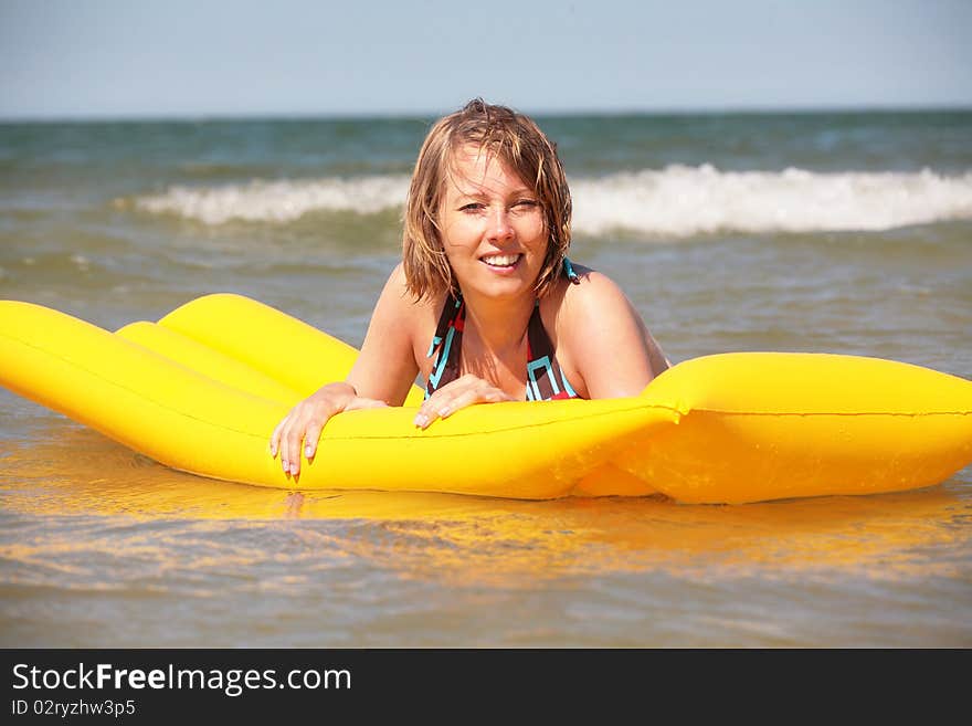 Pregnant woman on the beach