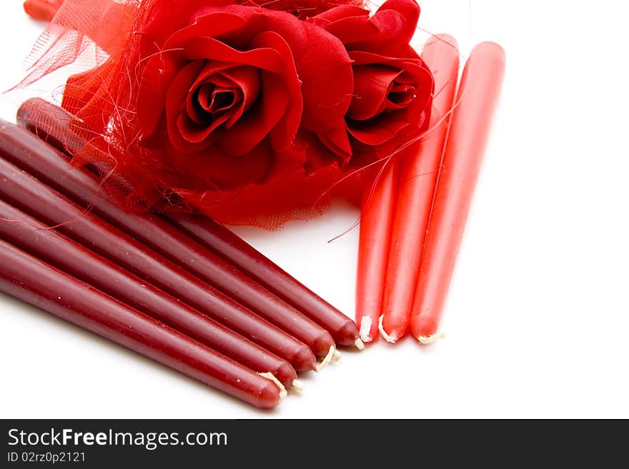 Red candle with rose