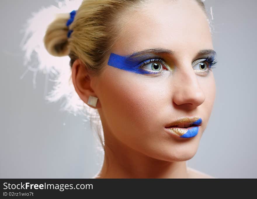 Model with art make up on white background. Model with art make up on white background