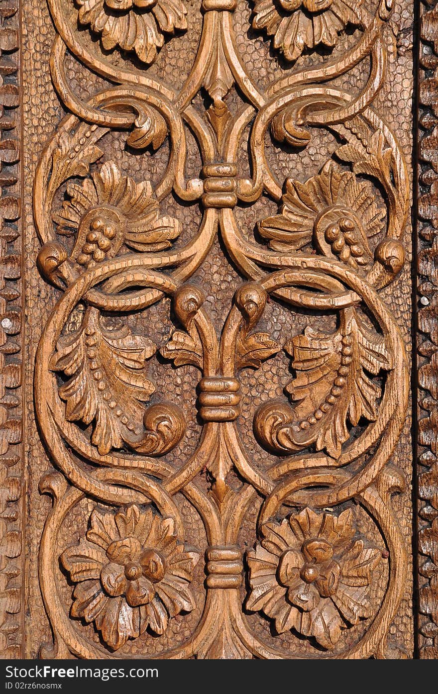 Detail of old carved wooden door. Detail of old carved wooden door