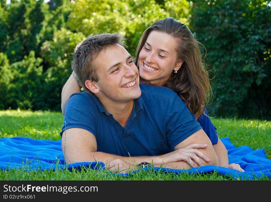 Attractive young couple in nature