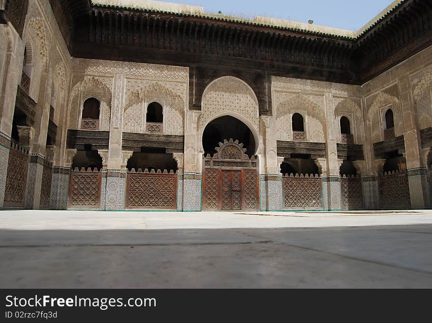 A view of the inside of the courtyard of a Koranic school in Fes. A view of the inside of the courtyard of a Koranic school in Fes