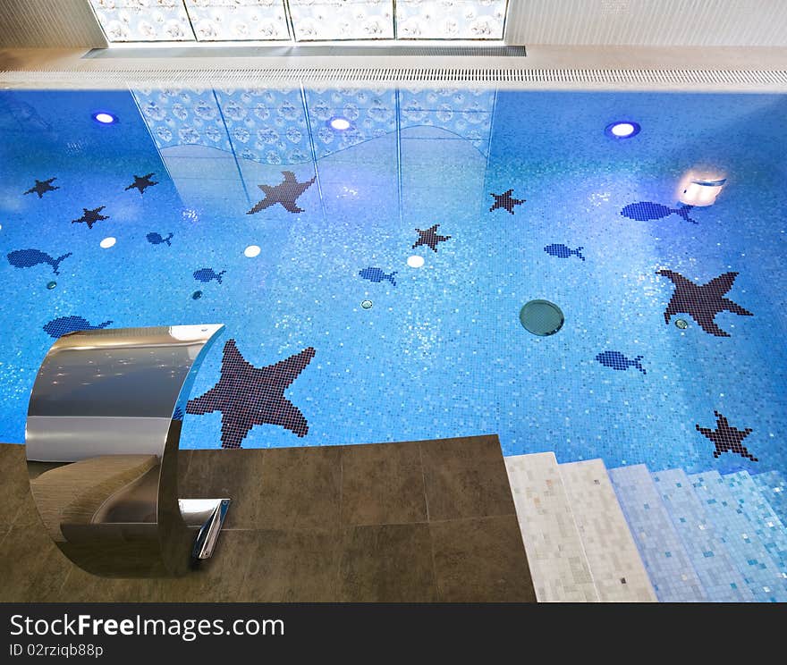 Interior of a swimming pool with blue mosaic. Interior of a swimming pool with blue mosaic