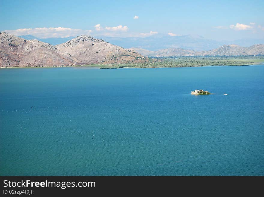 Landscape of Lake Skadarsko in Montenegro with Grmozur island called Montenegrin Alcatraz. Landscape of Lake Skadarsko in Montenegro with Grmozur island called Montenegrin Alcatraz