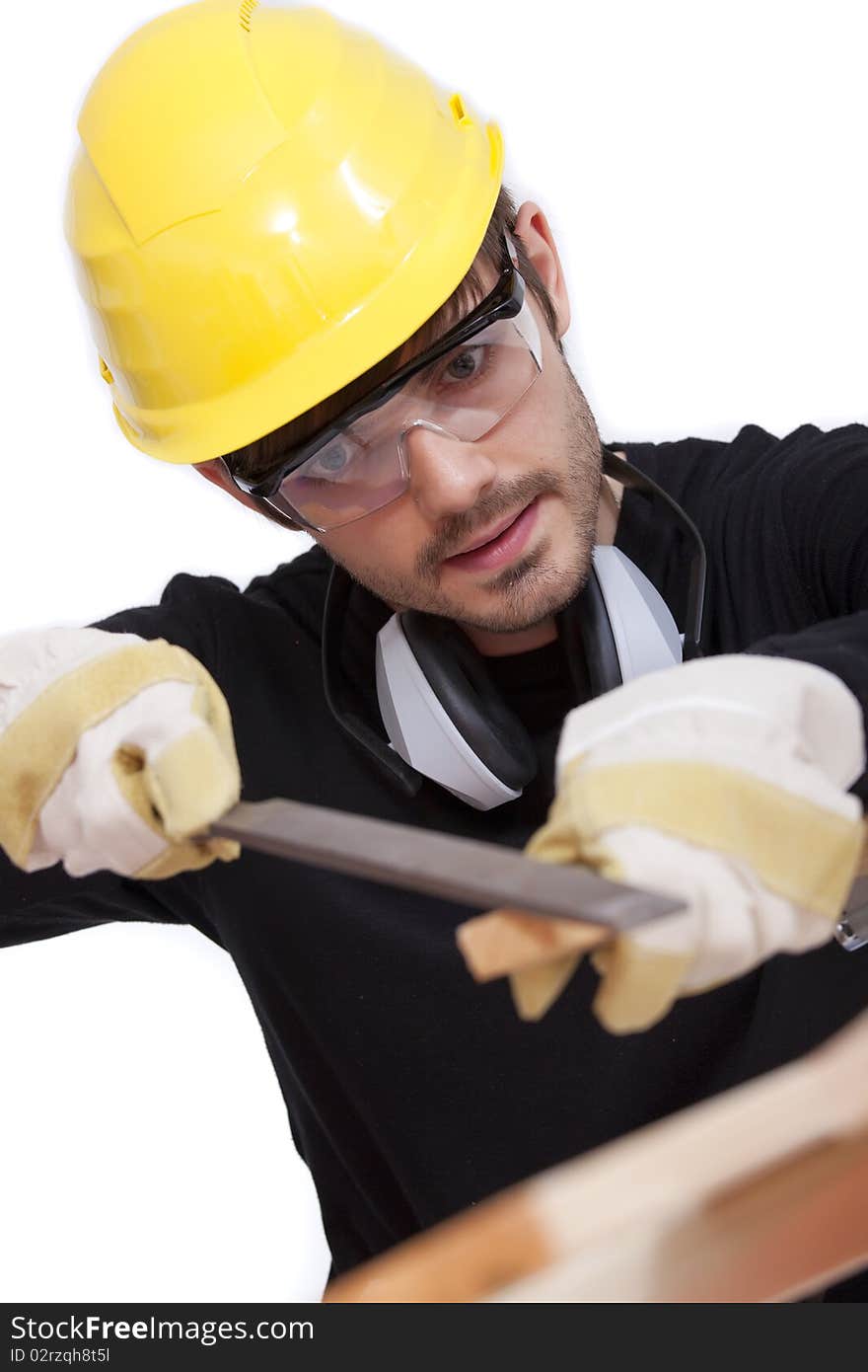 Construction worker grinding wooden bar on white background