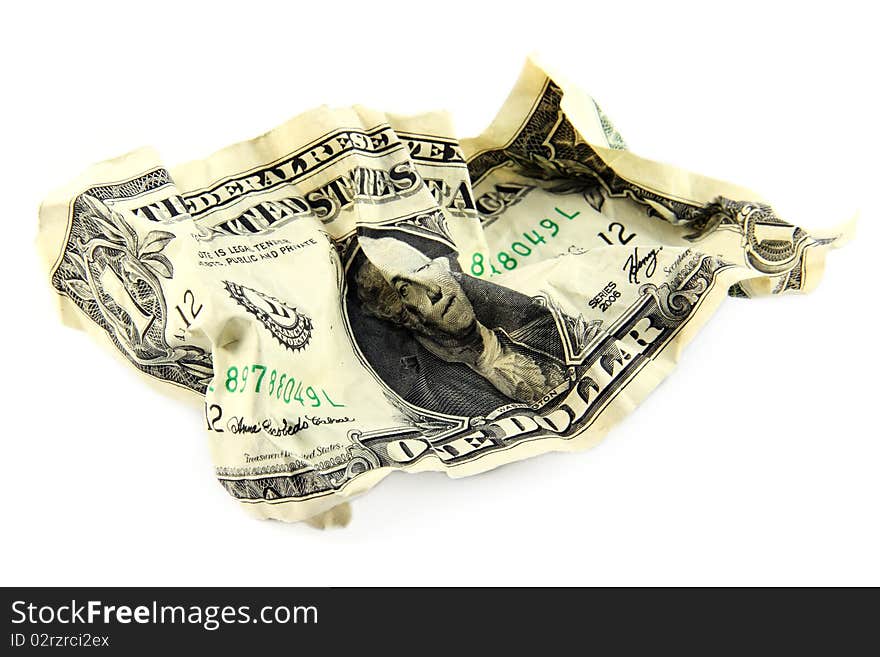 Crumpled one american dollar on white background