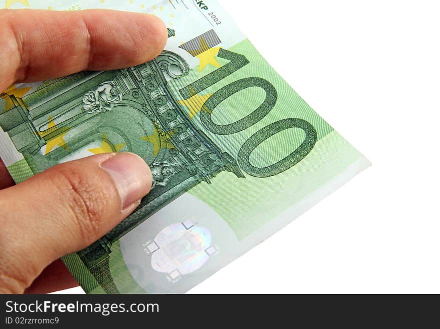 Hand holding a 100 euro bill; with clipping path