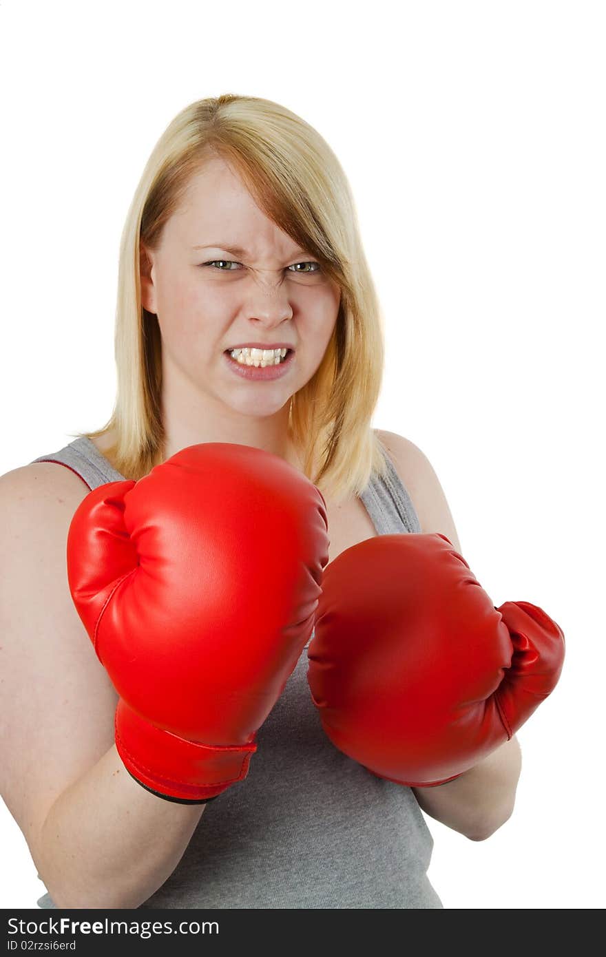 Young woman with red boxing gloves - isolated on white. Young woman with red boxing gloves - isolated on white