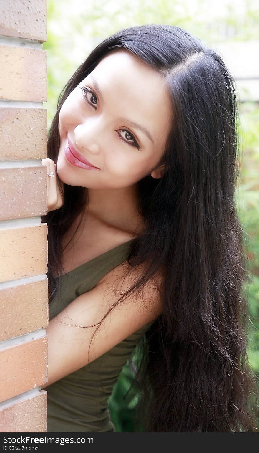 Beautiful Chinese girl smiling in summer. Beautiful Chinese girl smiling in summer.