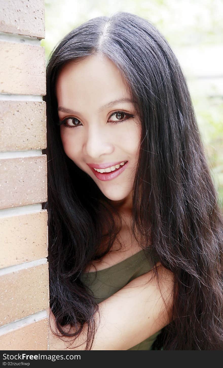 Beautiful Chinese girl smiling in summer. Beautiful Chinese girl smiling in summer.