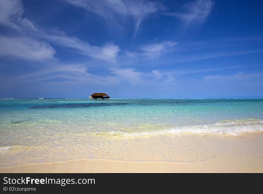 Medhufushi Island of Maldives with blue lagoon and water bungalows. Medhufushi Island of Maldives with blue lagoon and water bungalows