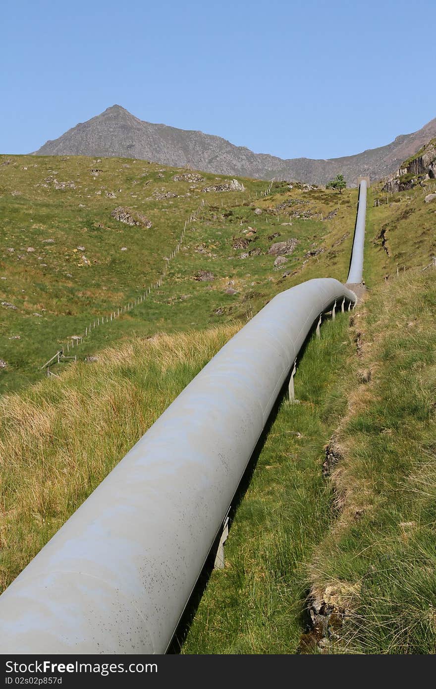 Water pipeline in the mountains of Snowdonia UK. Water pipeline in the mountains of Snowdonia UK.