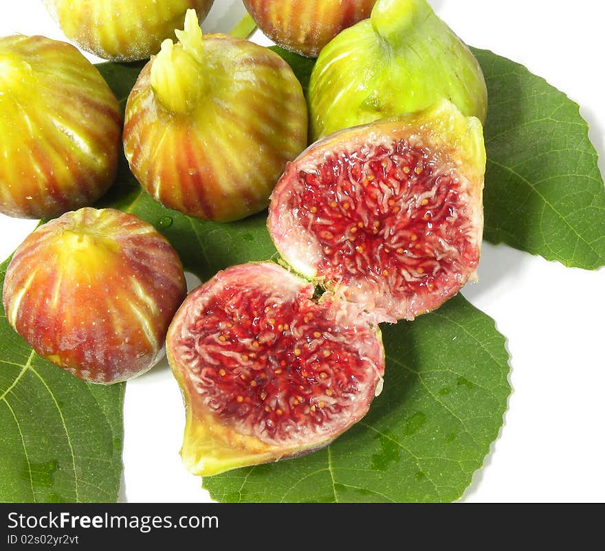 Ripe juicy figs isolated on white background