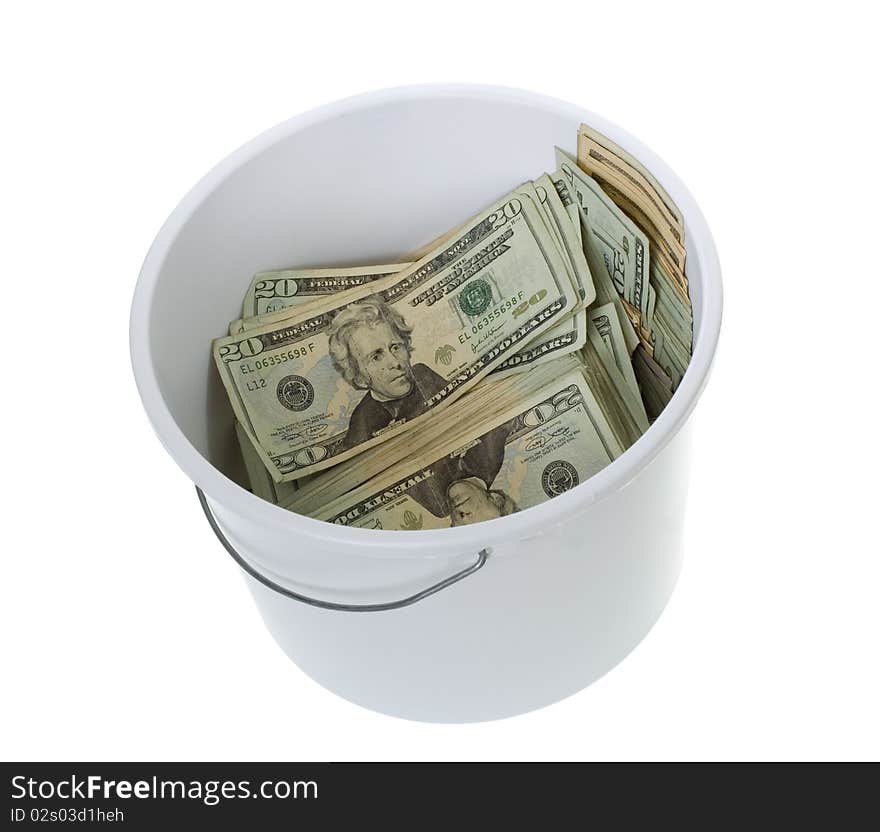 US Currency Twenty Dollar Bills in a white cleaning Bucket, isolated on white background. US Currency Twenty Dollar Bills in a white cleaning Bucket, isolated on white background.