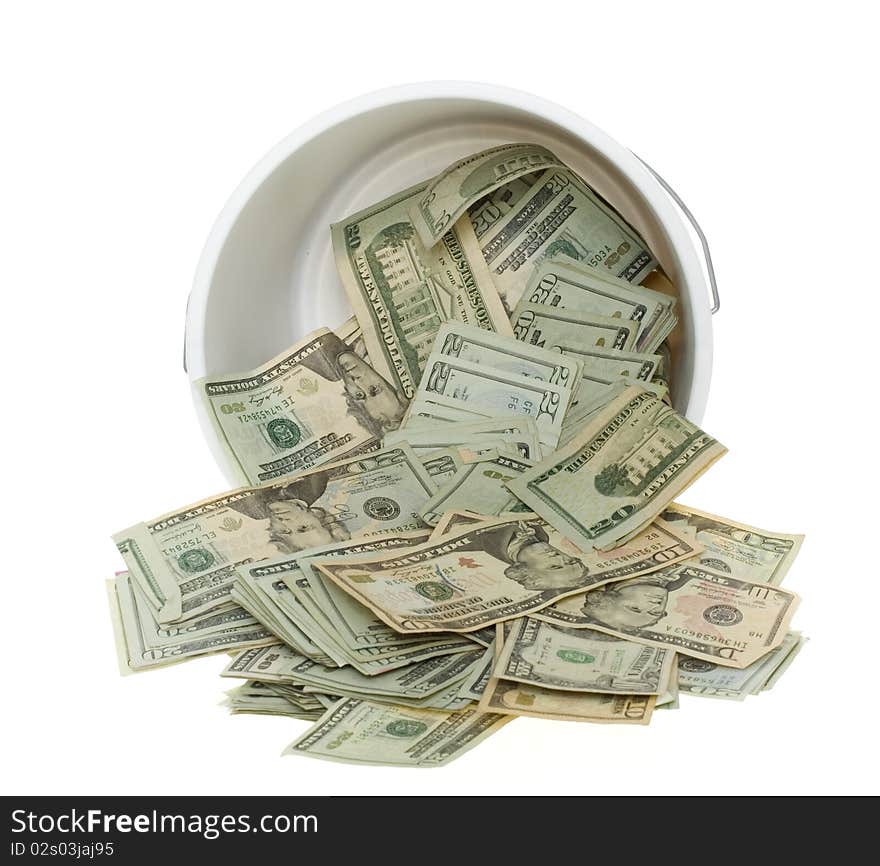 US Currency Twenty Dollar Bills Spilling out of a White Cleaning Bucket,  isolated on white background. US Currency Twenty Dollar Bills Spilling out of a White Cleaning Bucket,  isolated on white background.