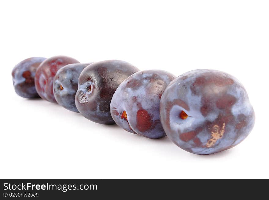 Ripe plum on white background (isolated, clipping path)