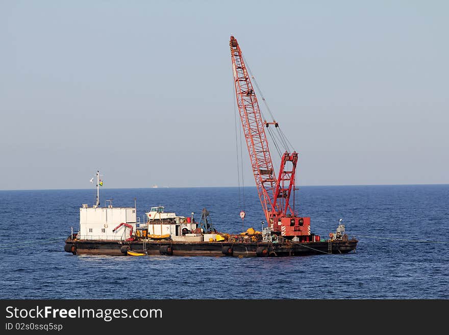 Floating crane used for recoveries from the seabed or other lifting at sea