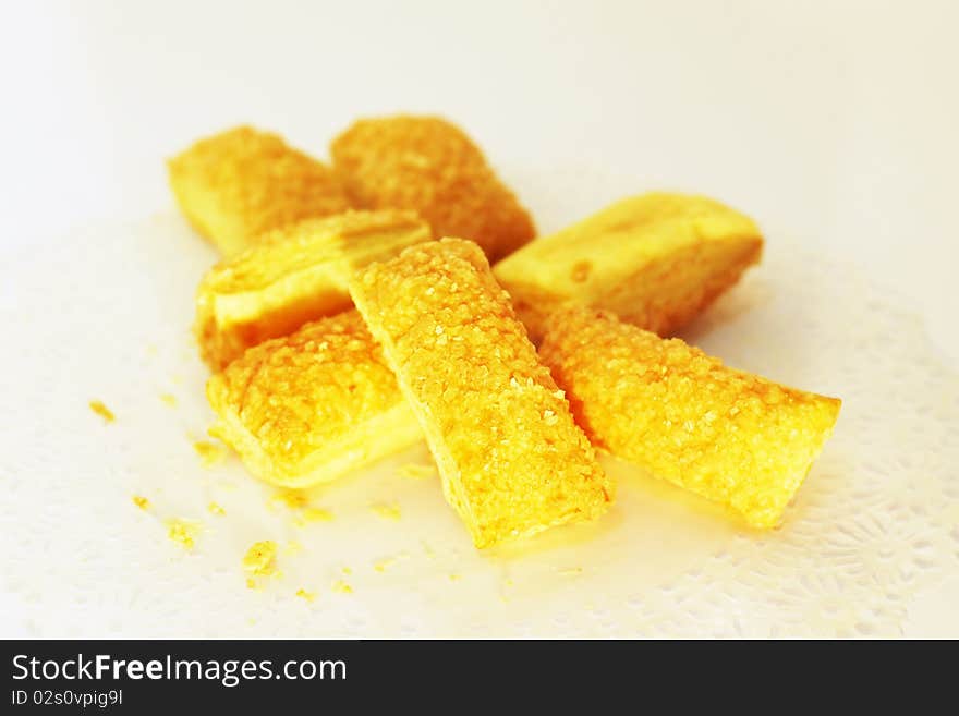 Sugar with crispy bread in white background. Sugar with crispy bread in white background