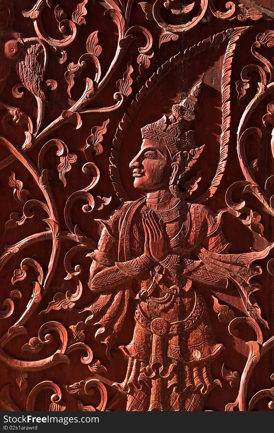 Angel in native Thai style wood carving