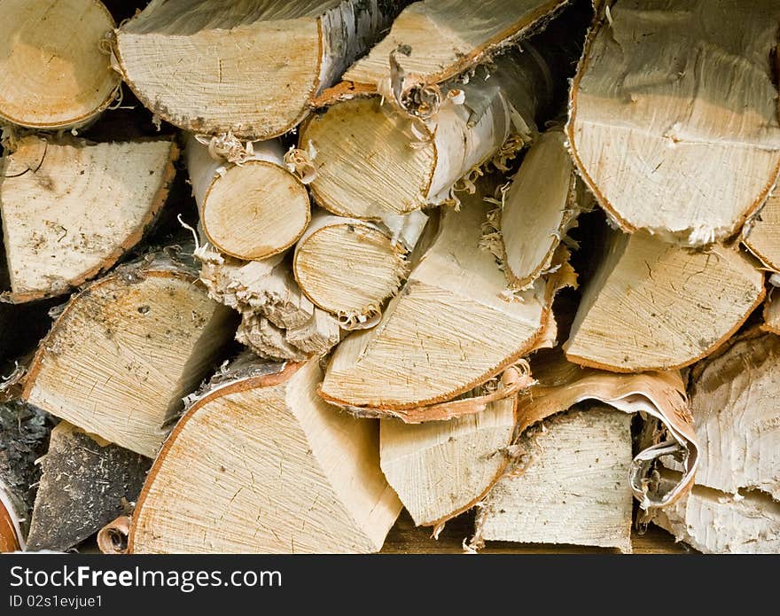 Chopped birch fire wood background. Chopped birch fire wood background