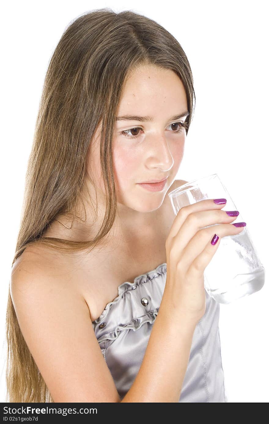 Young gril drinking water on white background. Young gril drinking water on white background