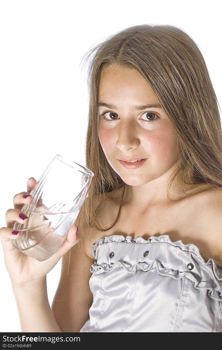 Young gril drinking water on white. Young gril drinking water on white