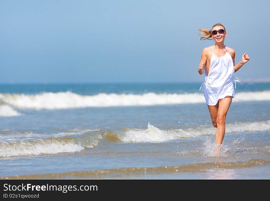 Woman running on the beach