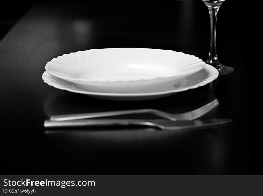 Silverware and a menu on a restaurant table