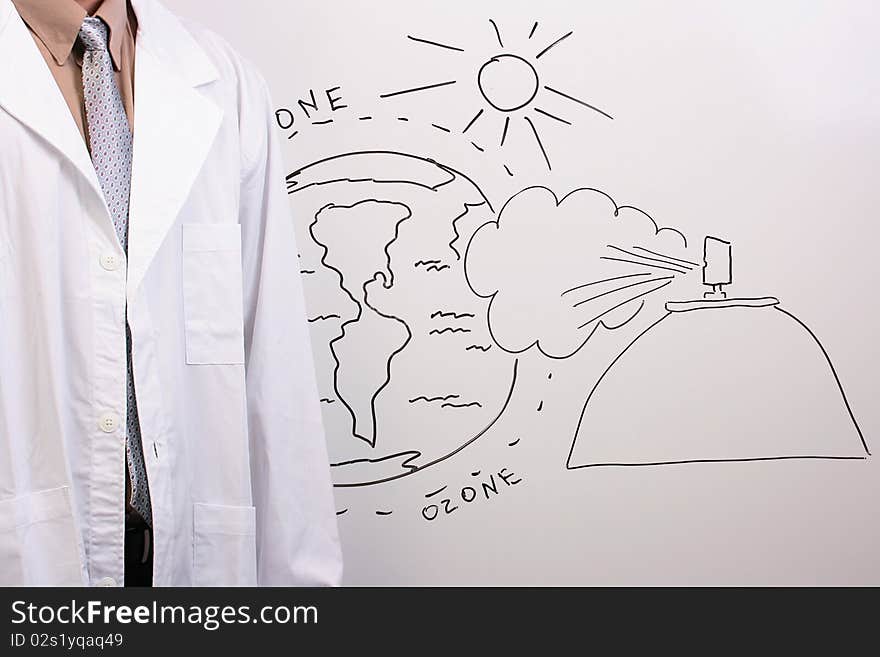 Man in a white lab coat standing next to a drawing of the ozone layer being in danger. Man in a white lab coat standing next to a drawing of the ozone layer being in danger.