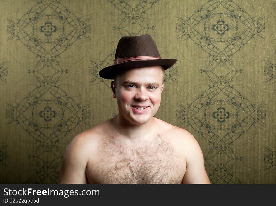 An image of a young man in a hat