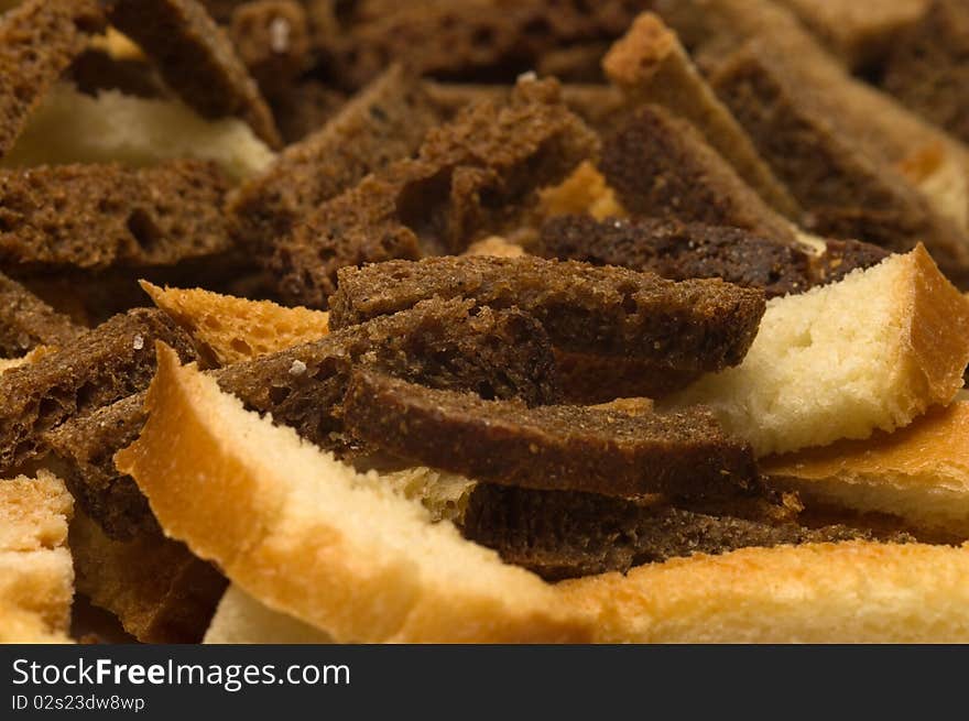 Background of rye and wheat crackers salty closeup. Background of rye and wheat crackers salty closeup.