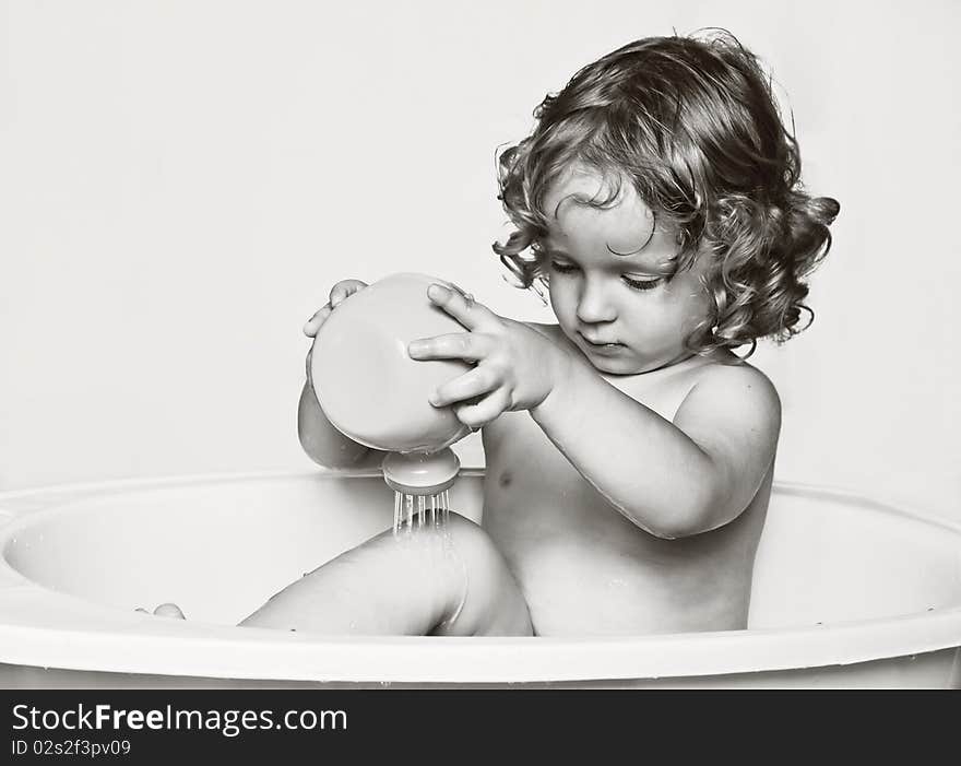 The little boy bathes in bathing. The little boy bathes in bathing.