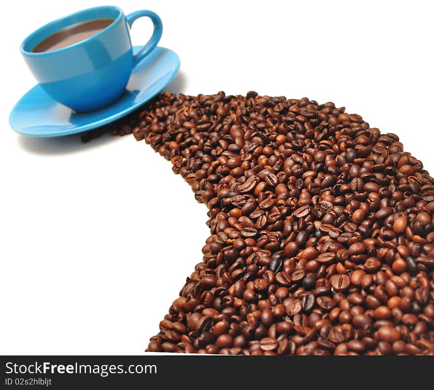 Coffee cup and grain on white background